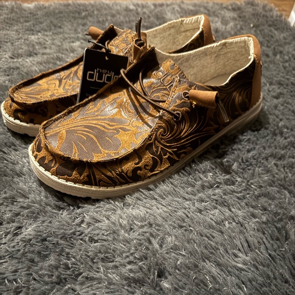 NWT Hey Dude Brown and Tan tooled Patterned Slip-Ons - Picture 1 of 5